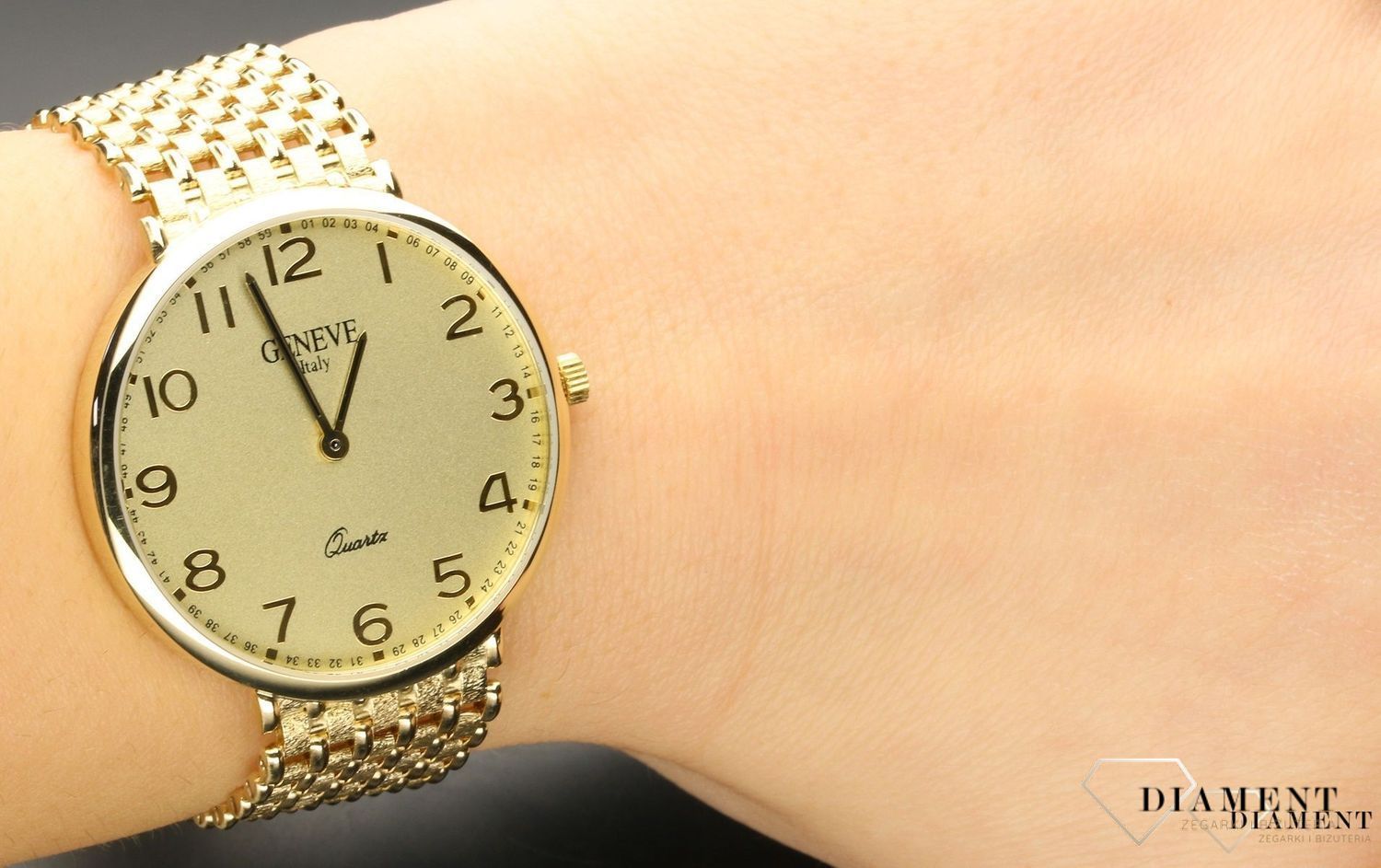 Złoty zegarek damski na bransolecie Geneve 0018D AU 585. Zegarek złoty damski ze złota 585 próba. Zegarek damski ze złota próba 585 o klasycznym wyglądzie na złotej bransolecie. Najwyższa jakość złota. Inwestuj w zło.jpg